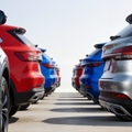 Row of colorful SUVs parked