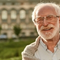 Portrait of a senior man smiling outdoors 