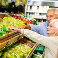 Senior couple grocery shopping