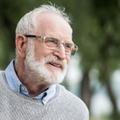 Smiling senior man in park