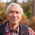 Portrait of senior man outdoors during fall