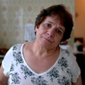 Woman in her 60s looking sad