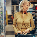 Boomer couple shopping for groceries