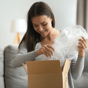 Woman opening an Amazon package 
