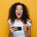 Happy woman holding cellphone