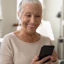 Older woman using a phone