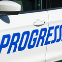 Progressive logo on SUV