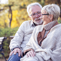 Older couple sitting on bench