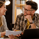 Couple doing finances on laptop