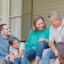 Smiling family on porch