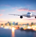 Airplane flying over water