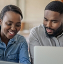 Couple looking at computer