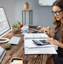 Woman doing side hustle taxes