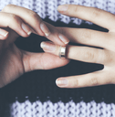 Woman removing wedding ring