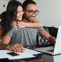 Couple comparing TaxAct vs Turbotax