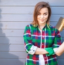 Woman painting house