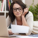 Woman looking at paperwork