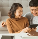 Couple calculating retirement savings