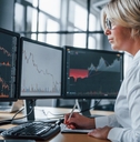 Hedge fund investor looking at computer