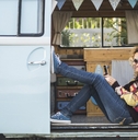 Woman sitting in van