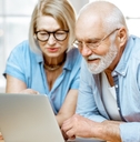 Couple looking at computer