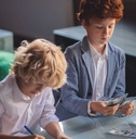 Two friends counting saved money and looking involved