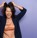 Woman stressed and pulling hair