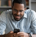 Man playing game on phone