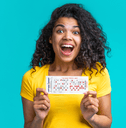 Woman holding lottery ticket