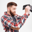 man holding empty wallet