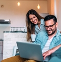 Couple looking at computer