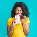 woman with lottery ticket