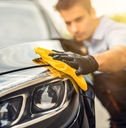 Man detailing car