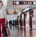 Woman walking through airport