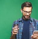 happy man holding cellphone