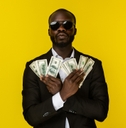 man holding a lot of cash