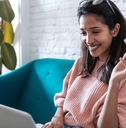 pretty young woman shopping online with credit card