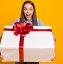 Woman holding large gift box