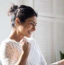 Happy woman reading letter