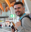 Smiling man at airport