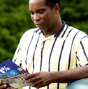 man getting mail from mailbox