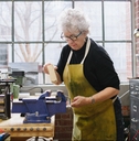 Art Jeweler Working in Studio