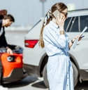 Woman calling road assistance 