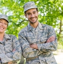 Two people in military uniforms