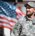 Smiling military veteran in camouflage
