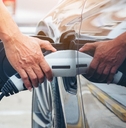 charging modern electric car battery on the street
