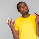 Man holding credit cards in each hand