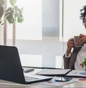 woman working on laptop at office