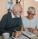 senior couple planning for a vacation