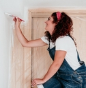 woman painting home improvement